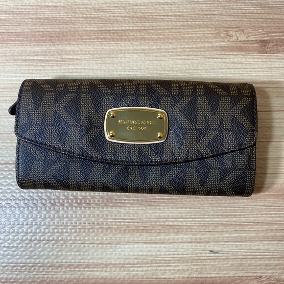 Michael Kors Jet Set Slim Flap Wallet in Brown Monogram PVC - Picture 1 of 9